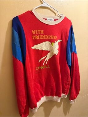 O'Neill Red Crewneck Sweatshirt with Blue Sleeve Panels and Cream Trim